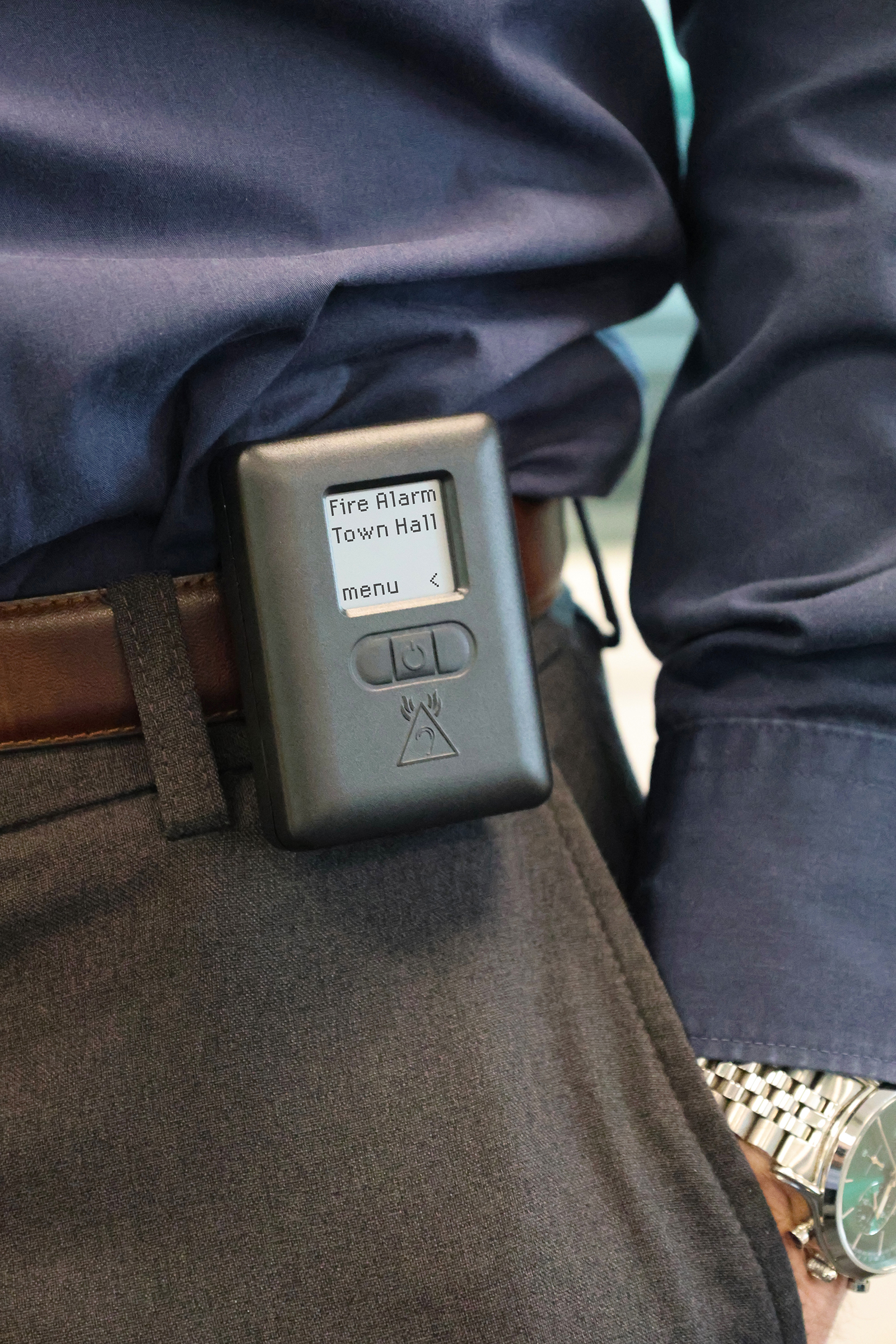 Alerter on belt An image showing the new Alerter attached to a user's belt